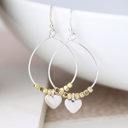 worn-silver-teardrop-earrings-with-golden-beads-heart